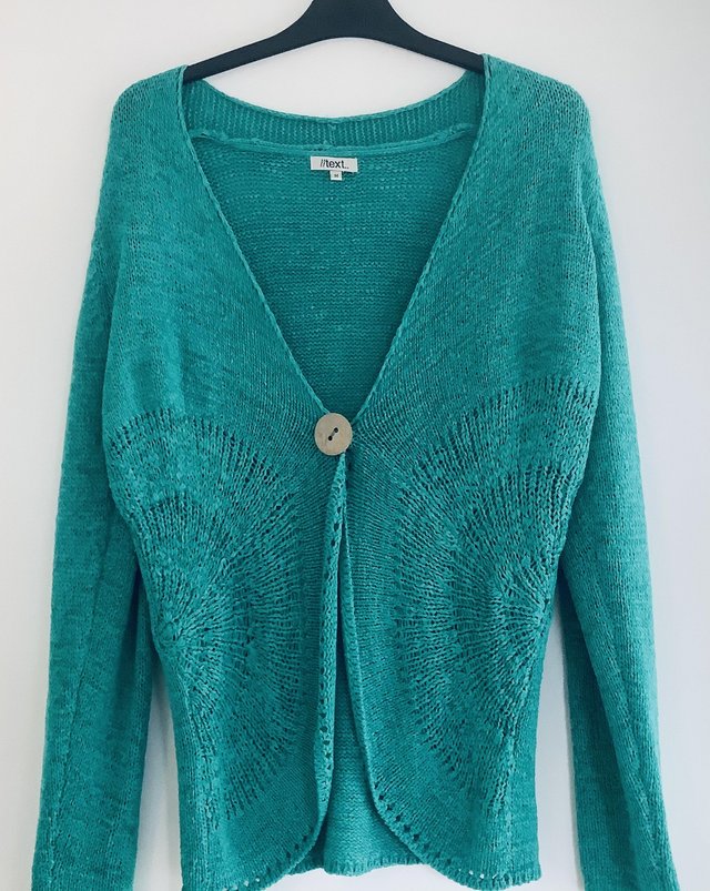 Preview of the first image of //text Green Cardigan.