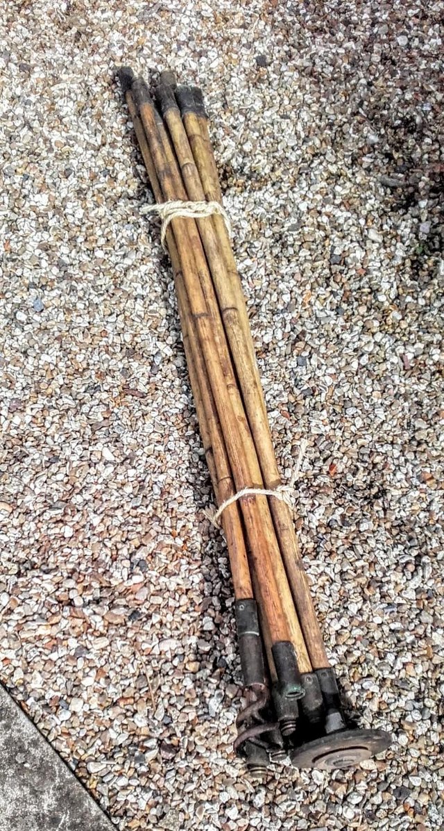 Preview of the first image of Vintage bamboo drain rods decorative item.