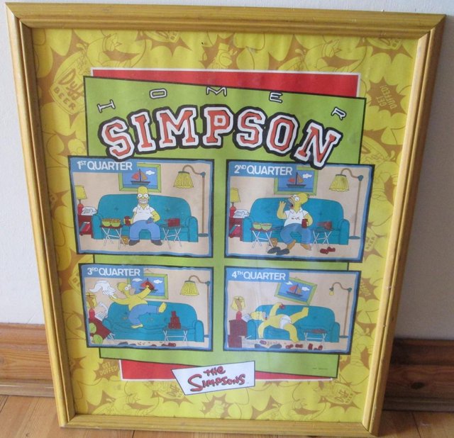 Preview of the first image of Simpsons wall mounted picture behind glass.