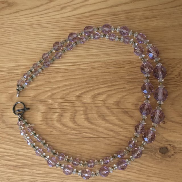 Preview of the first image of Double stranded vintage clear lilac faceted glass necklace.