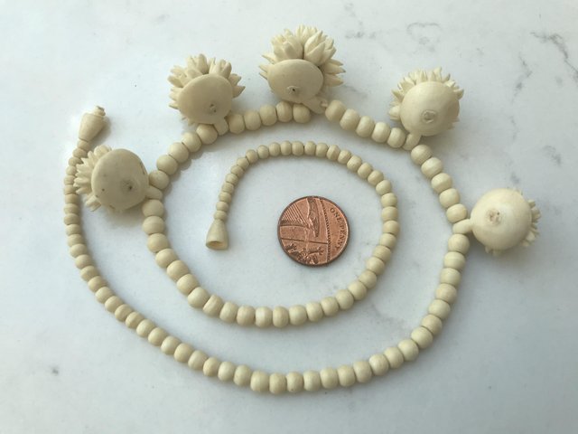 Image 2 of Carved bone (?) tribal necklace flowers 19” approx