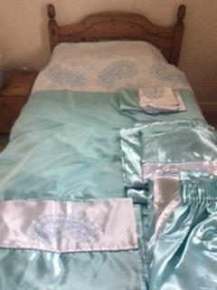 Preview of the first image of Single bedding plus two pairs of curtains.