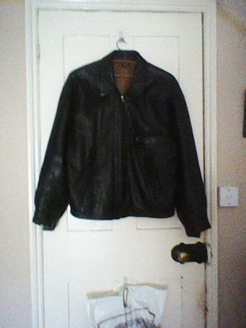 Preview of the first image of MANS BLACK LEATHER JACKET.