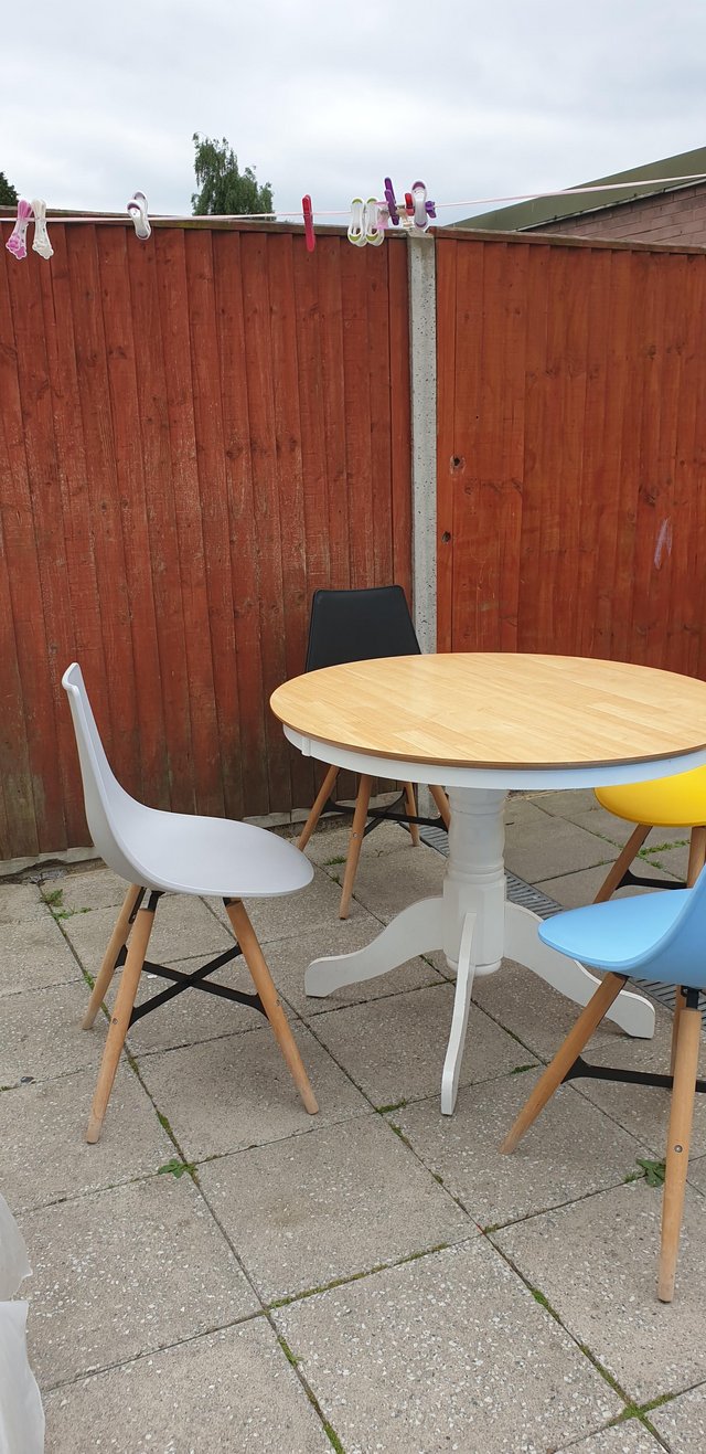 Image 2 of Modern round dining table and chairs