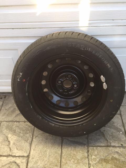Preview of the first image of Car Tyre - unused, with steel rim.