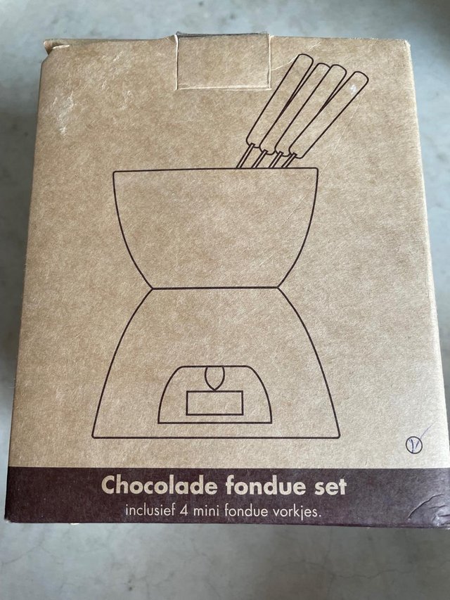 Preview of the first image of Chocolate Or Cheese Fondu Set with 4 Fondu Forks and Tea Lig.