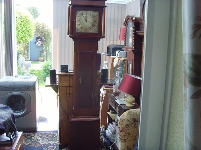 Preview of the first image of Solid brass face, mahogany cased Grandfather clock.