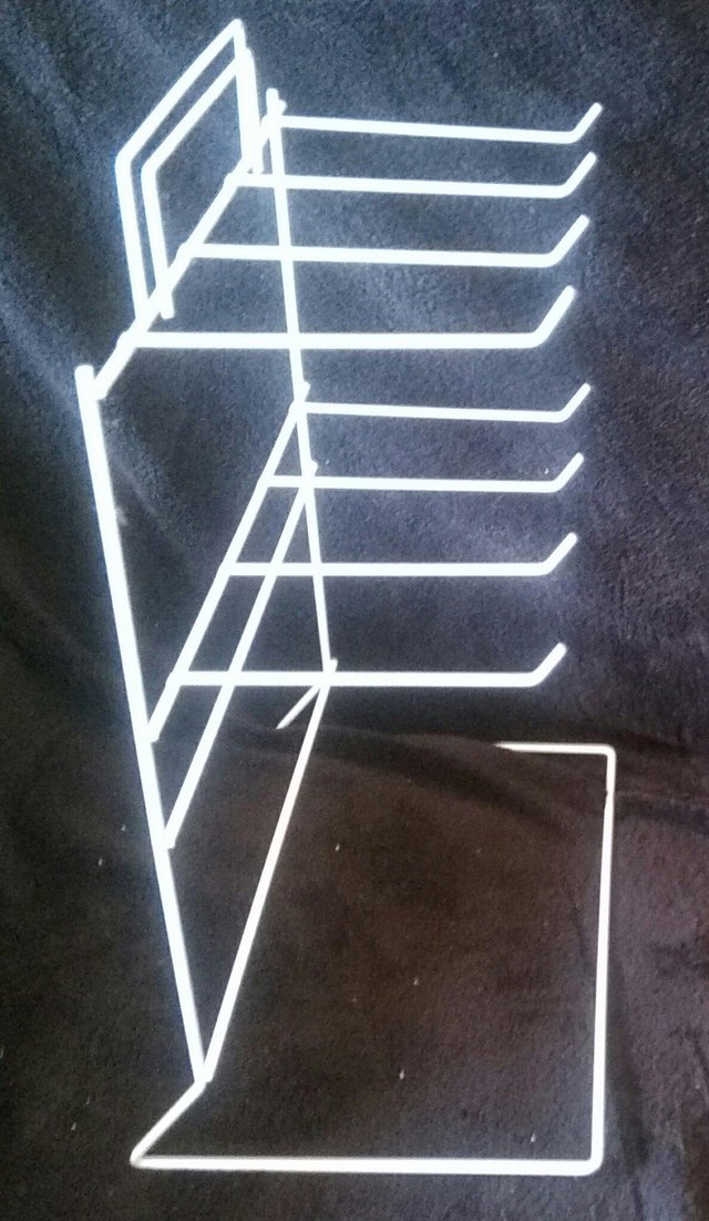 Preview of the first image of White Counter Stand with eight   Hooks ....