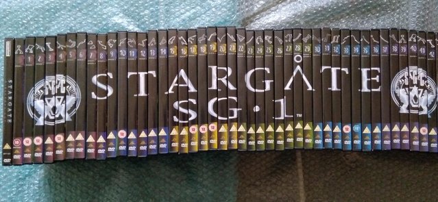 Preview of the first image of Stargate SG-1 The Dvd Collection with Magazines & Binders.