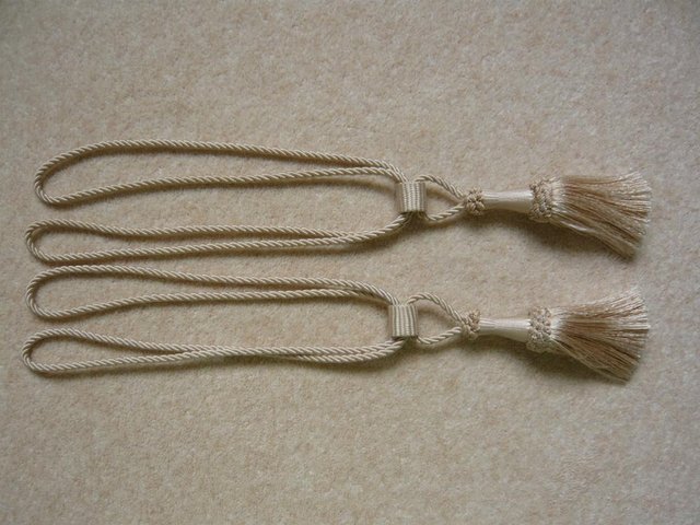 Preview of the first image of Tie backs for curtains, a pair with tassels.