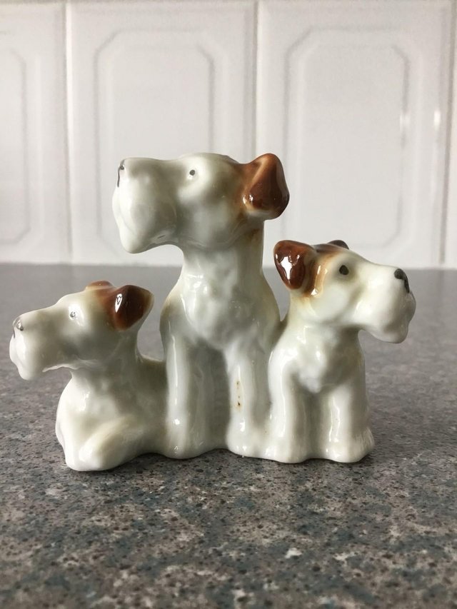 Preview of the first image of Lovely three dogs ornament.