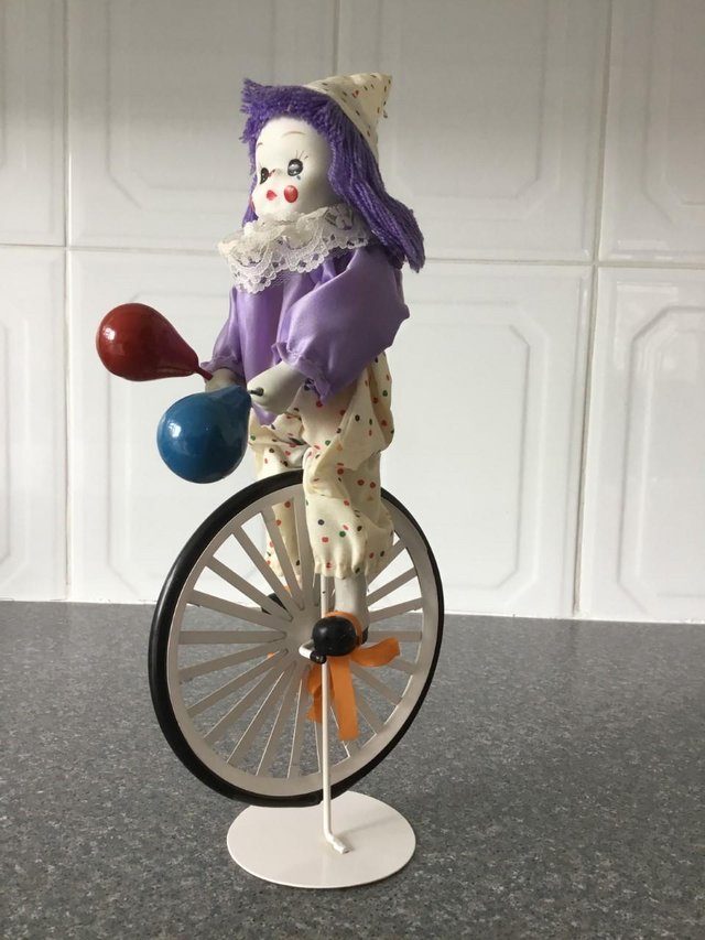 Image 2 of Clown on one wheel bike with balloons