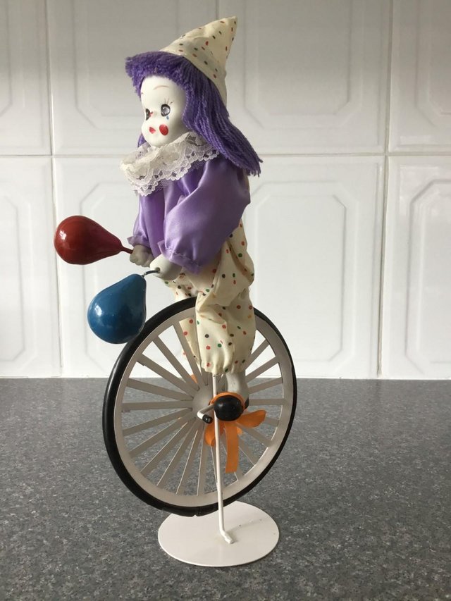 Image 3 of Clown on one wheel bike with balloons