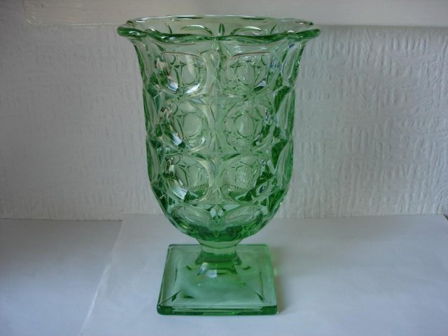 Preview of the first image of GREEN GLASS CELERY VASE.