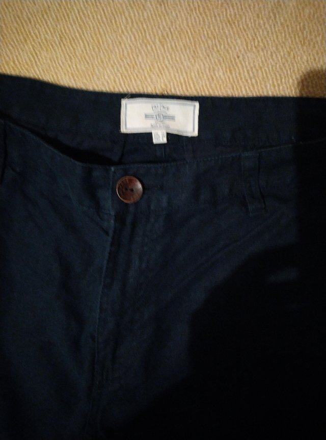 Preview of the first image of Size 10 Fat Face navy linen trousers.