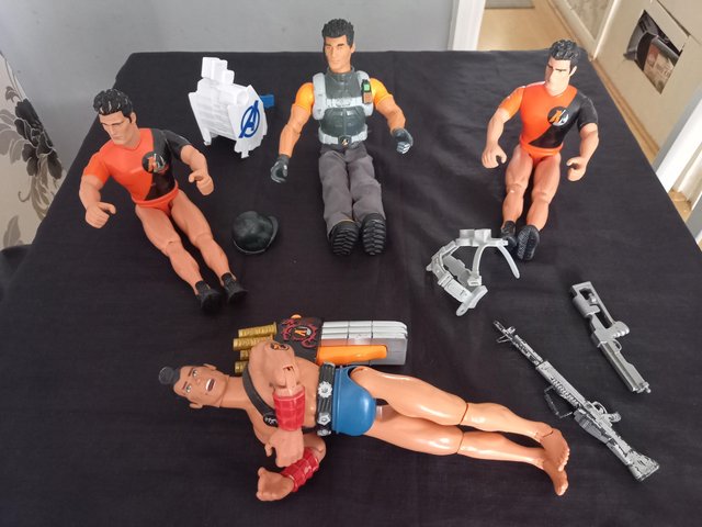 Preview of the first image of 4 Action Men and 1 Army figure.
