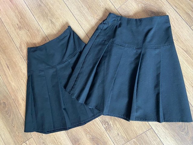 Preview of the first image of M&S Black School Skirts  11-12 years.