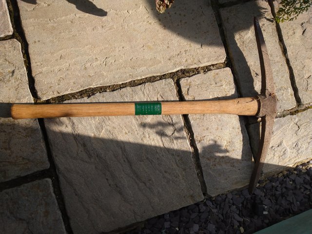 Preview of the first image of Wooden handled Pick axe for sale.