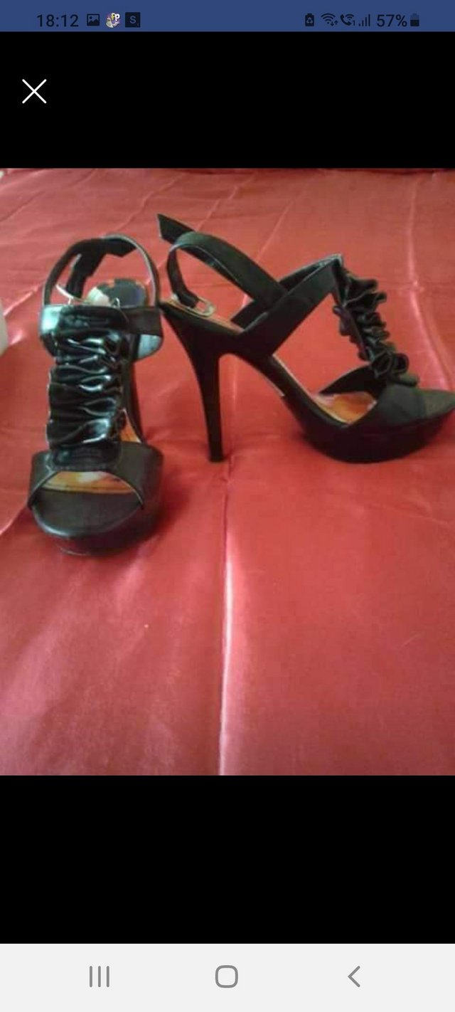 Preview of the first image of Worn ONCE. Size 3 BLACK RUFFLE SHOES.