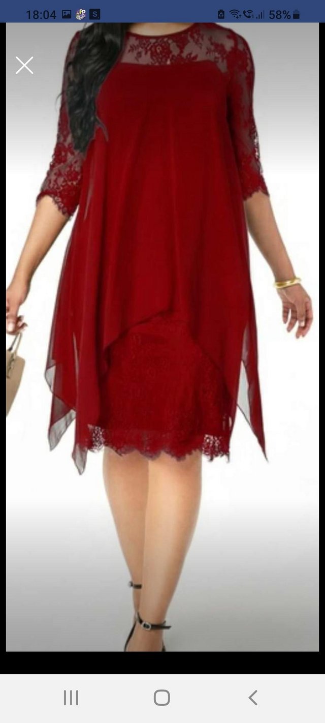 Preview of the first image of Brand new never worn red dress size 22.
