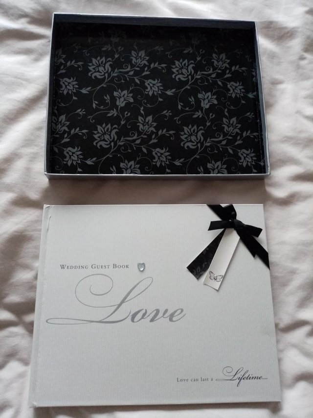 Preview of the first image of Wedding Guest book. Good condition.