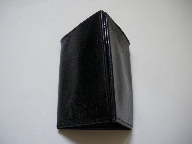 Preview of the first image of Unique Airmotive Ireland Real Leather Trifold Wallet.