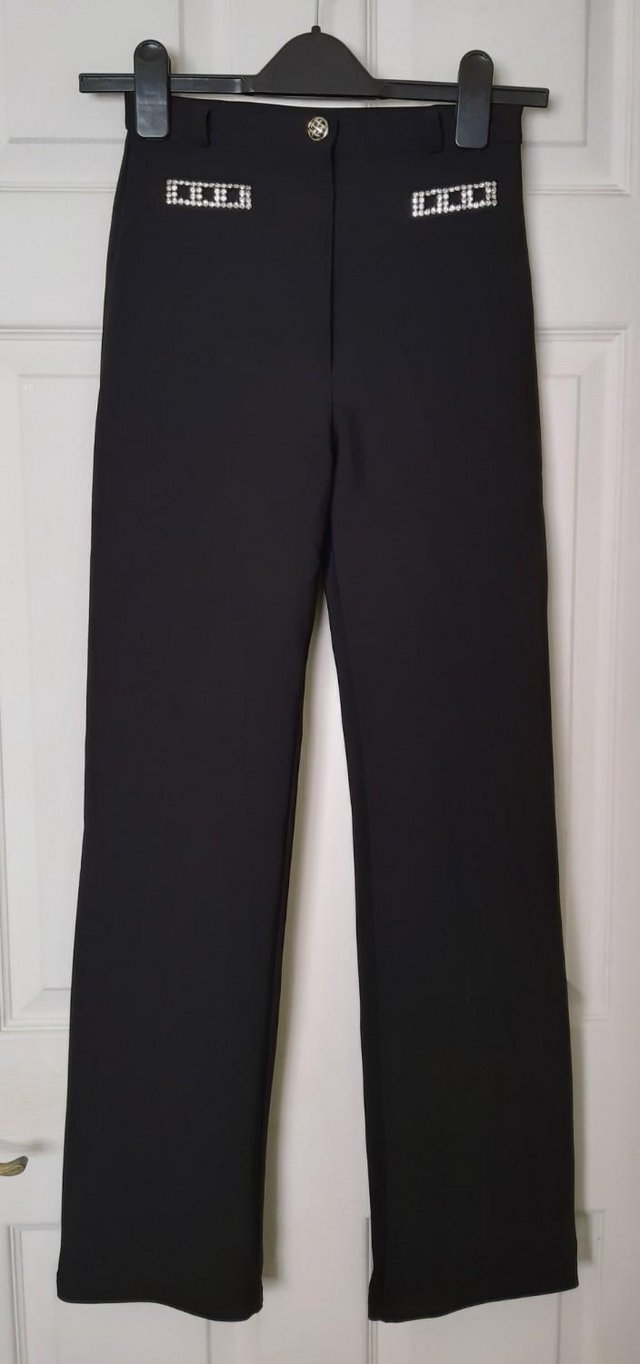 Preview of the first image of Ladies Designer Black Trousers By Tension Of Paris - Size T1.