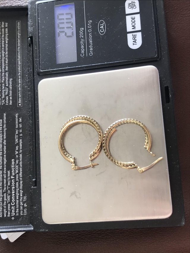 Preview of the first image of 375 9ct gold hoop earrings pierced ears.