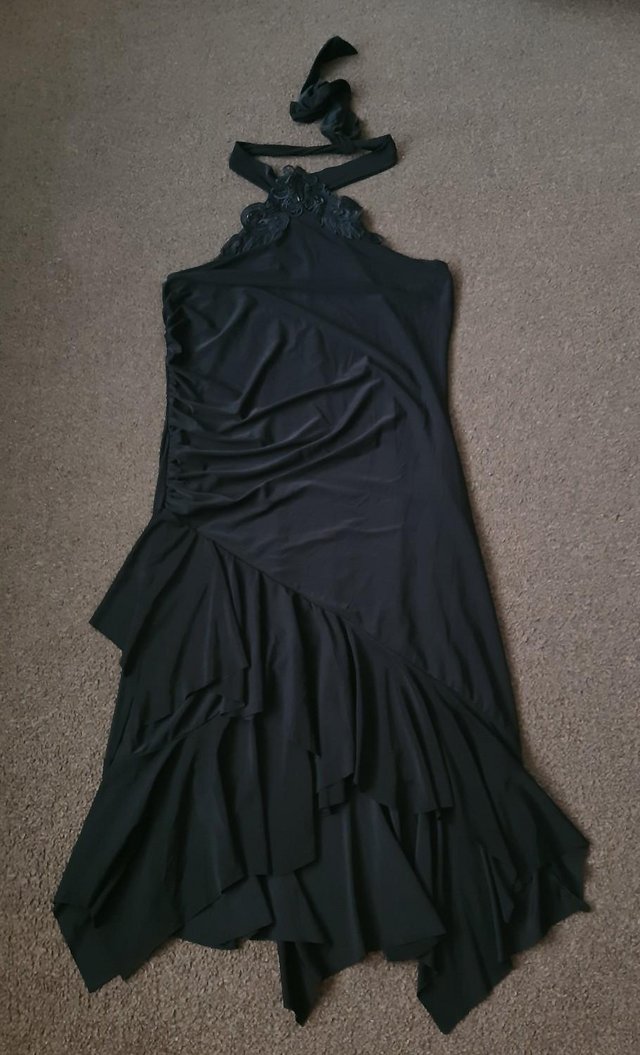 Preview of the first image of Stunning Ladies Black Halter neck Dress By Mk One - Size 16.
