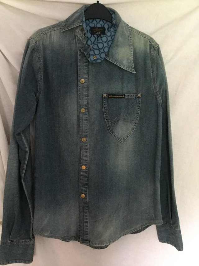 Preview of the first image of Vivienne Westwood designer denim shirt.