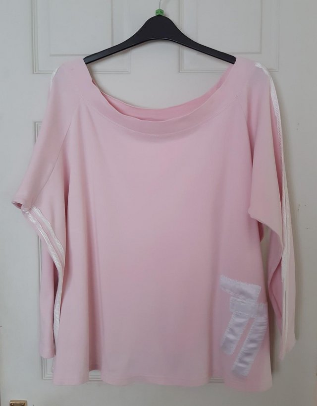 Preview of the first image of Ladies Plus Size Pink Top By Seven - Size 32.