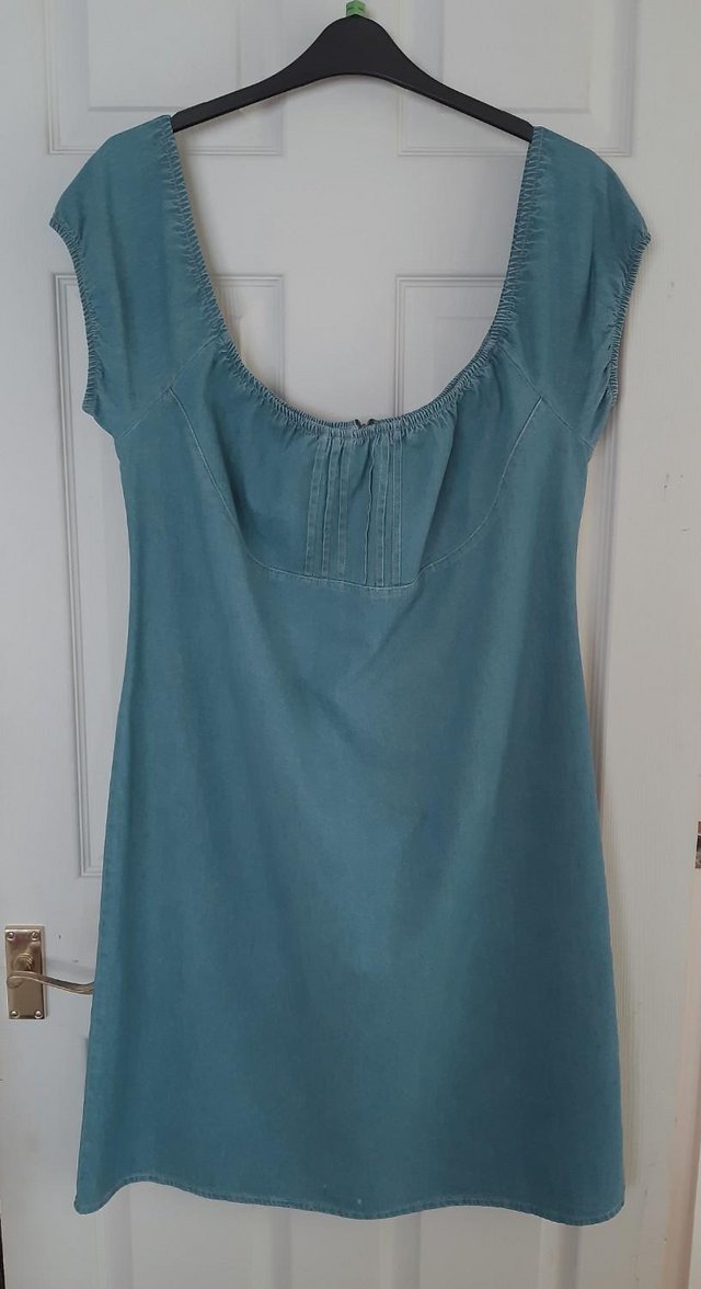 Preview of the first image of Beautiful Plus Size Off The Shoulder Denim Dress.