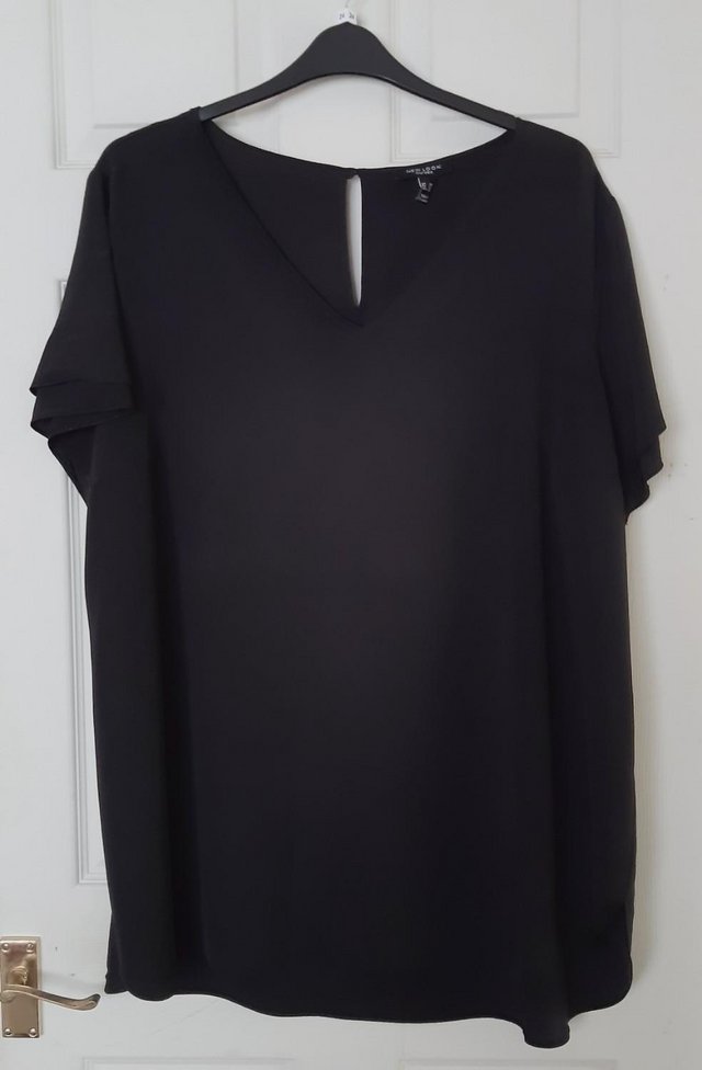 Preview of the first image of Beautiful Ladies Black Blouse By New Look Curves - Size 24.