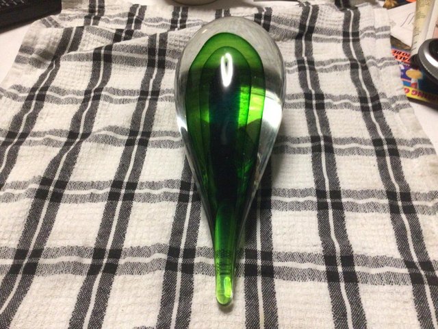 Preview of the first image of Romano style glass green tear drop paper weight.