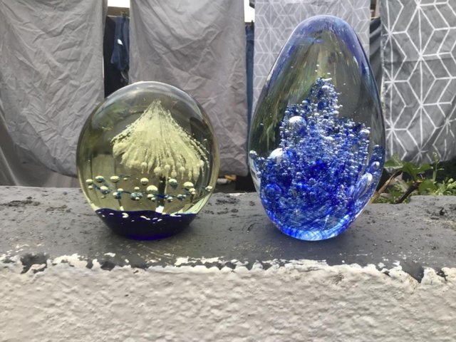 Image 3 of 2 Heavy glass paper weights in pear drop and ball shapes