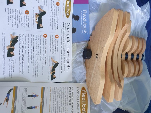 Preview of the first image of Flexi Bak Wooden Posture Stretch Back Exerciser.