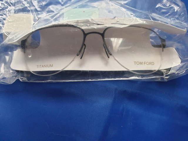 Preview of the first image of Tom Ford Genuine Designer Glasses Titanium Frame.