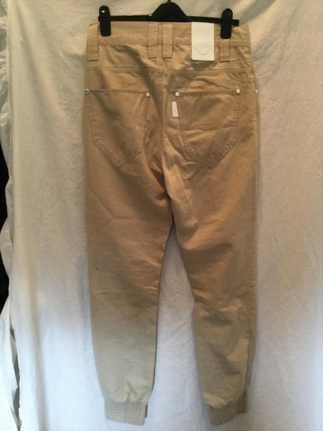 Preview of the first image of Vintage HUMOR Arch Leg Camel/Beige Chino jeans.