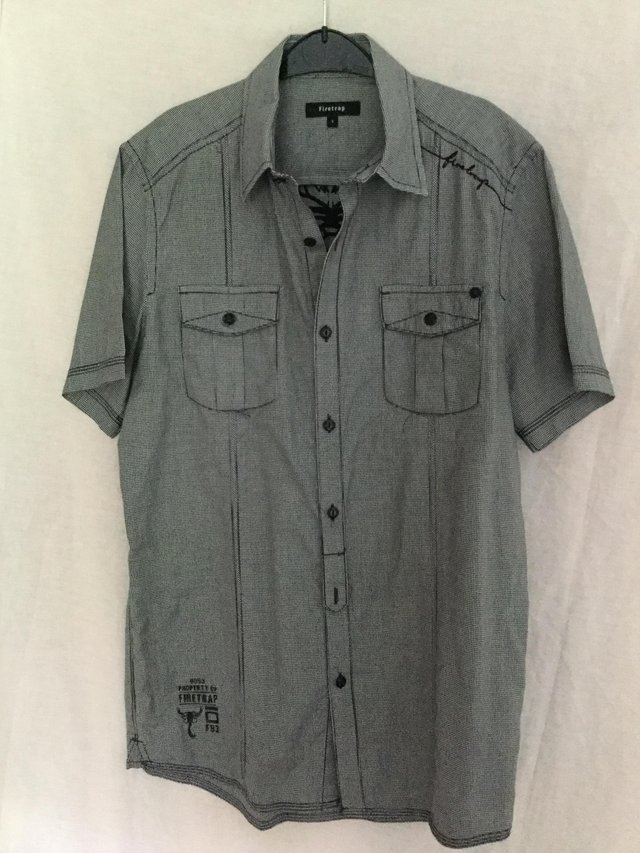 Preview of the first image of Designer short sleeve shirt with logo on back  by Firetrap.