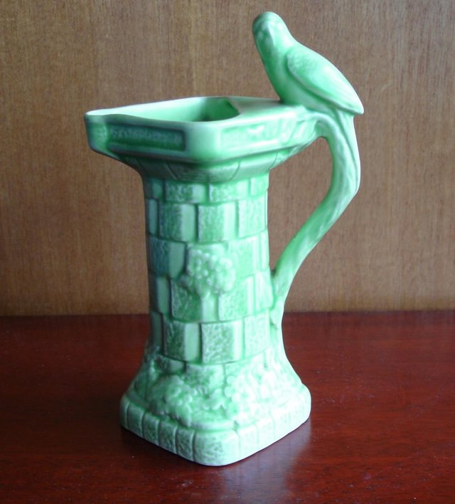 Preview of the first image of WADE ART DECO GREEN CERAMIC VASE.