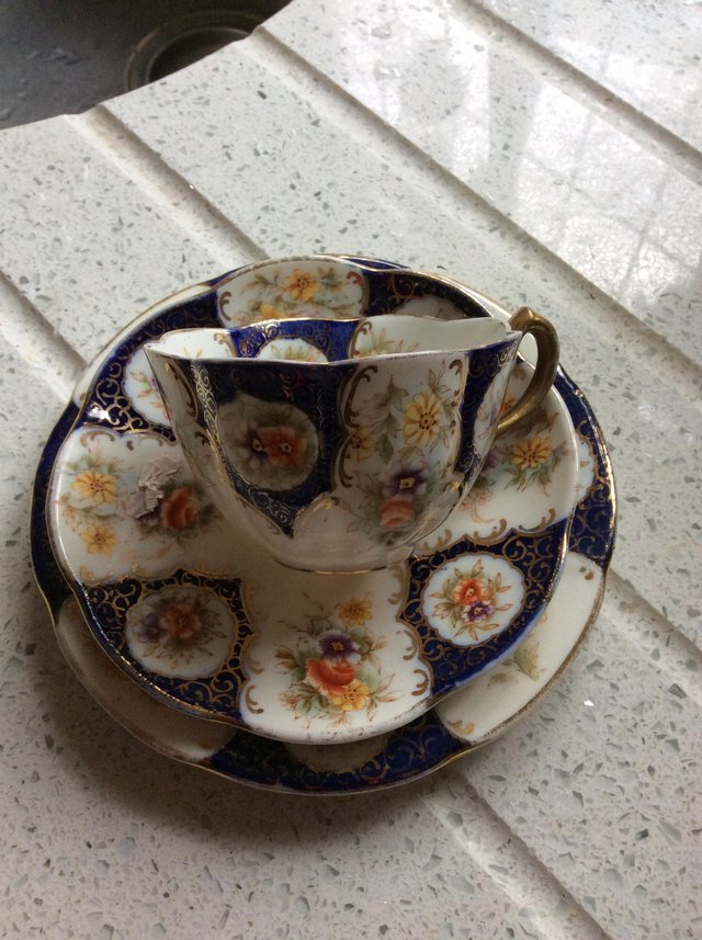 Preview of the first image of Antique china trio, cup, saucer and side plate.