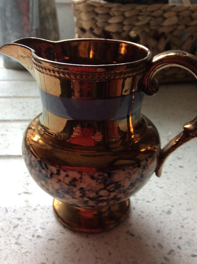 Preview of the first image of Pretty vintage lustre jug with small floral pattern.