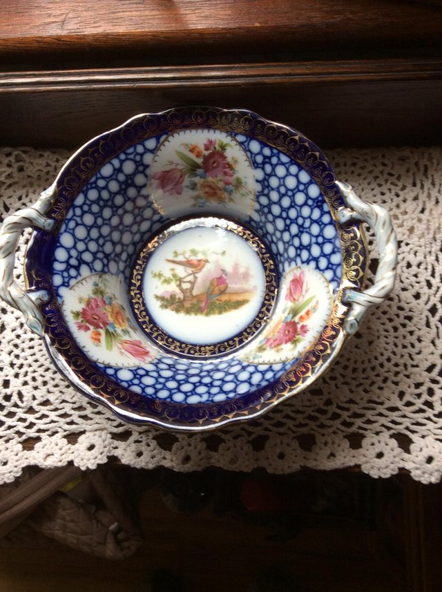 Image 3 of Extremely pleasing antique bowl with birds and flowers