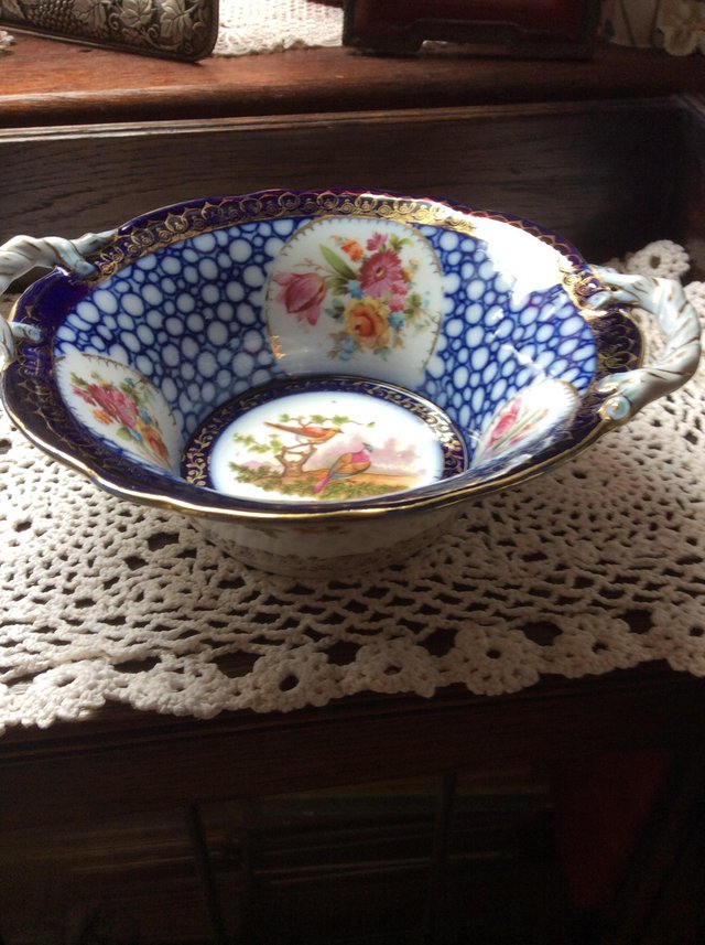 Preview of the first image of Extremely pleasing antique bowl with birds and flowers.