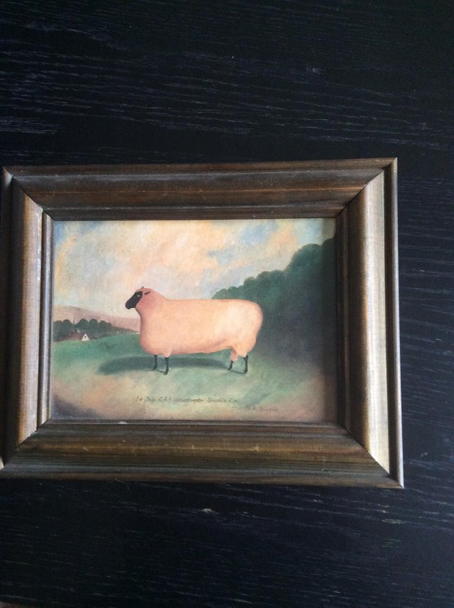 Preview of the first image of Small picture of a sheep in wooden frame.