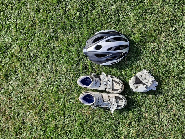 Preview of the first image of Giant helmet, Shimano clip on shoes, large gloves.