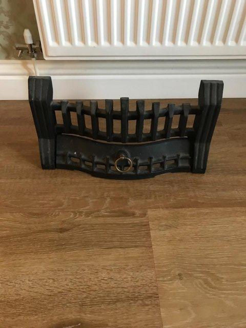 Preview of the first image of Black Cast Iron Fire Grate and Front.