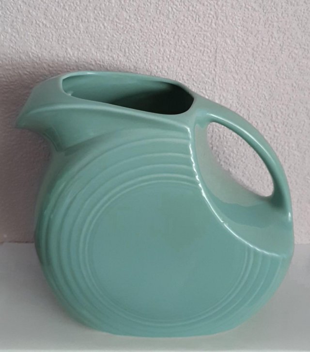 Preview of the first image of Homer Laughlin Fiesta Ware Large Disc Pitcher In Periwinkle.