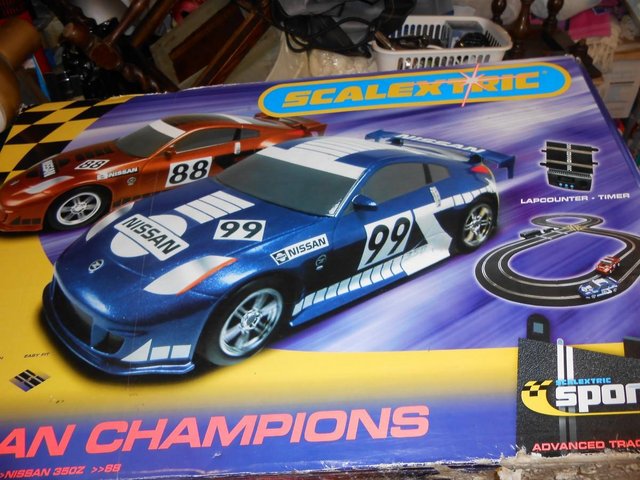 Preview of the first image of Scalextric with two Nissan 350Z cars.