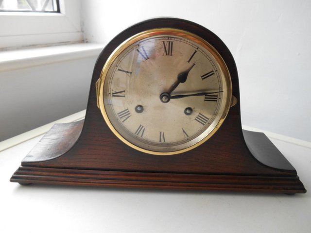 Preview of the first image of A German Napoleon Hat shaped striking mantle  clock.